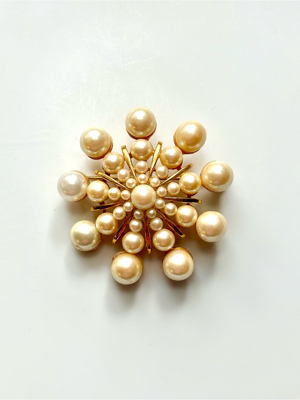 Vintage faux pearl starburst brooch